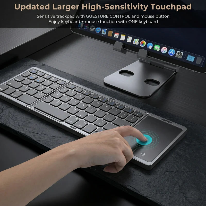 Keyboard with touchpad and mouse function on a dark surface
