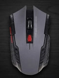 Gray gaming mouse with red accents on a dark surface