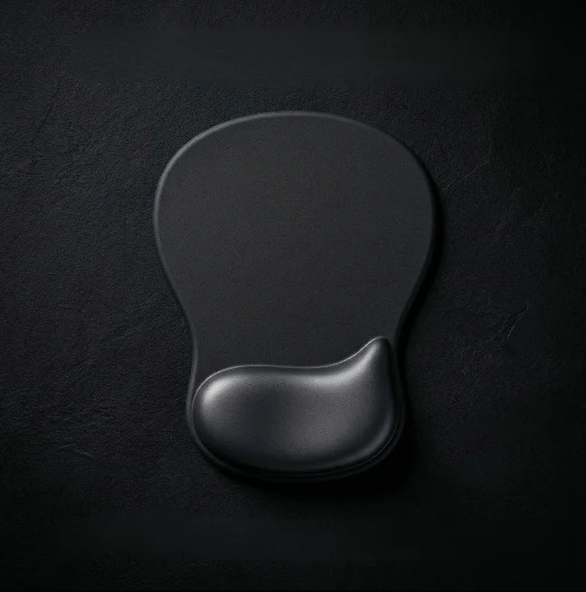 Black wrist rest on a dark textured surface